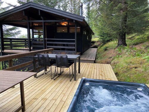 The Secret Cabin with hot tube in nature reserve close to Reykjavik 