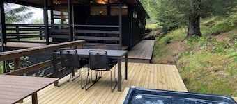 The Secret Cabin with hot tube in nature reserve close to Reykjavik