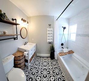 Bathtub, hair dryer, towels