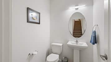 Bathtub, hair dryer, towels