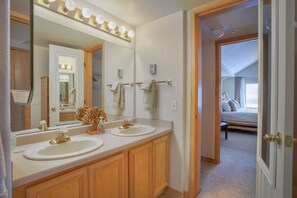 Combined shower/bathtub, hair dryer, towels, soap
