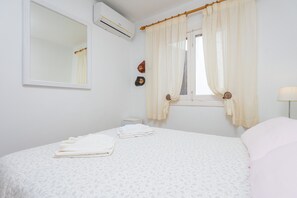 2 dormitorios, tabla de planchar con plancha, wifi gratis y ropa de cama