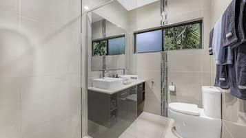Shower, hair dryer, towels, soap