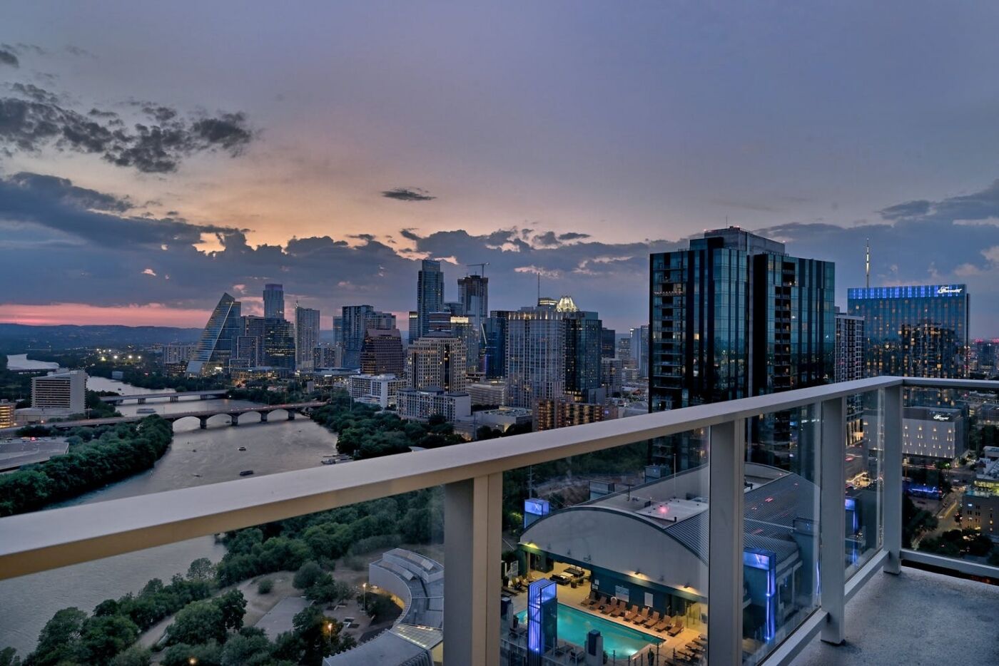 Rainey St corner condo with lakeview balcony, home office, pool & gym - dog-friendly