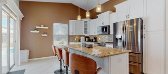 Family home with pool, large fenced-in yard, WiFi, central AC - dog-friendly