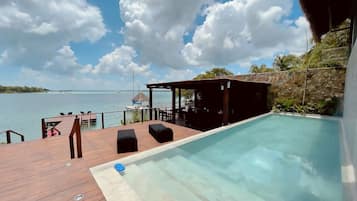 Outdoor pool, open 8:00 AM to 6:00 PM, free cabanas, sun loungers