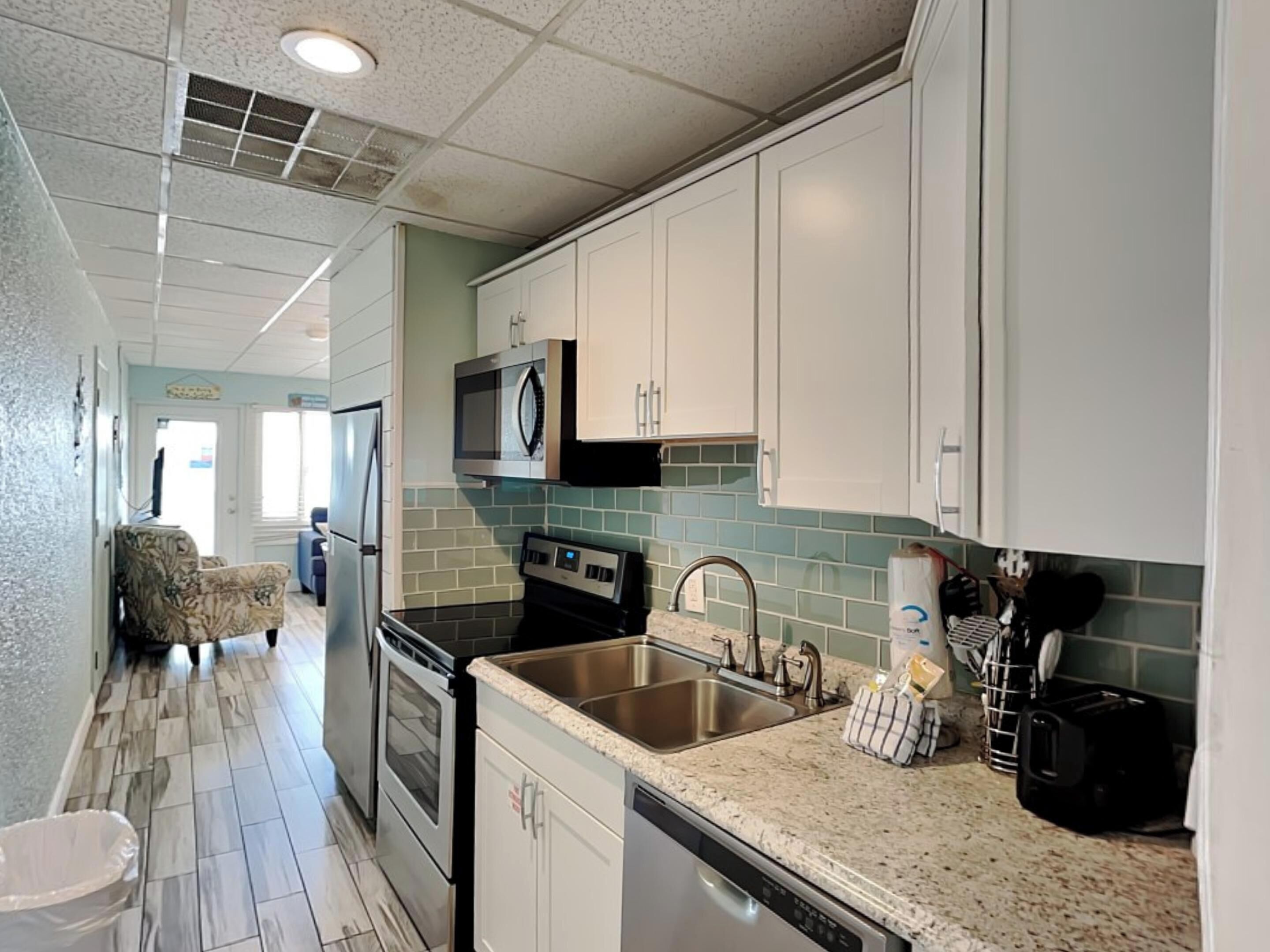 Condo, Multiple Beds, Patio, Ocean View (#319 & 320 - No Pets) | Private kitchen | Fridge, microwave, oven, stovetop