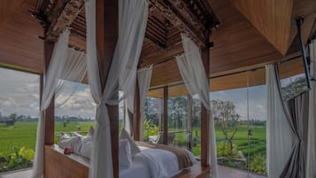 Chambre Deluxe | Minibar, coffres-forts dans les chambres, bureau