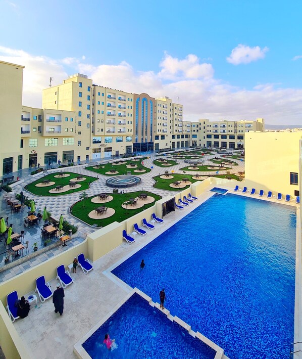 Outdoor pool, pool umbrellas, pool loungers