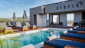 Seasonal outdoor pool, pool umbrellas, pool loungers