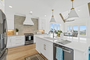 Fridge, microwave, oven, stovetop - Big Orange Beach House at Ocean Isle Beach, custom home with Private heated pool and great views (Ocean Isle Beach)