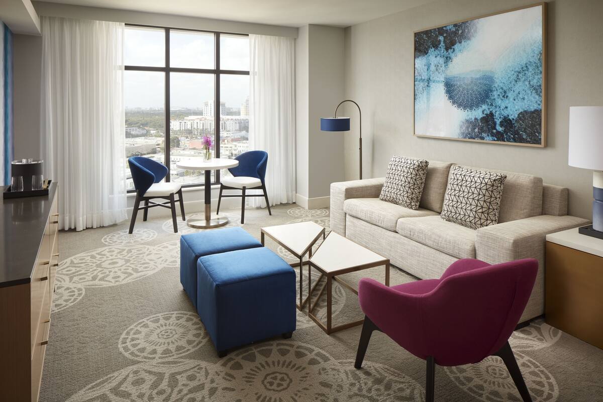 grand suite, corner | living area | 55-inch smart tv with satellite channels, tv, streaming services