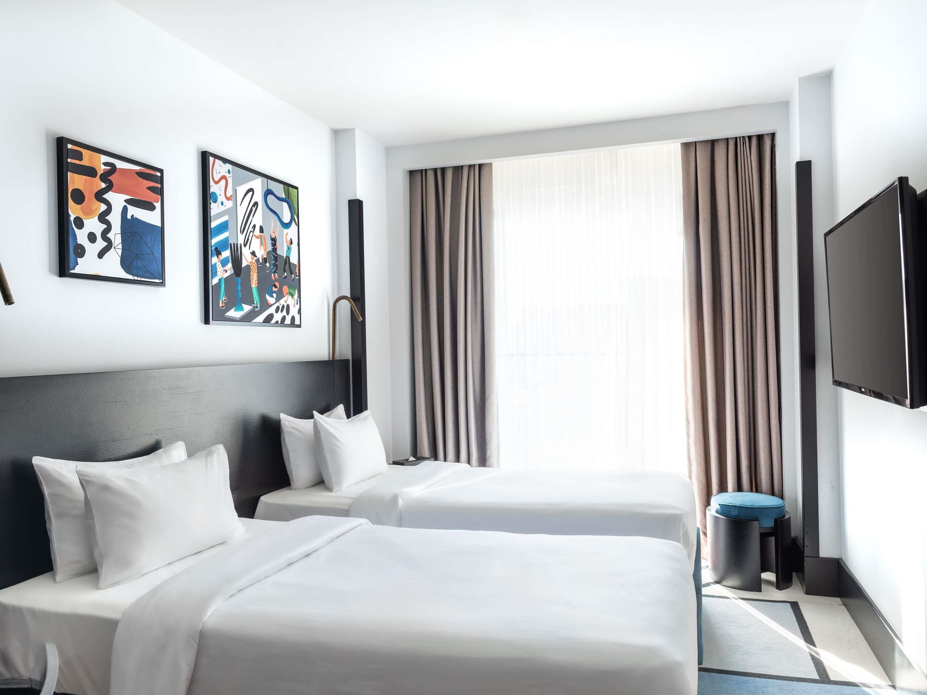 Hypo-allergenic bedding, minibar, in-room safe, desk