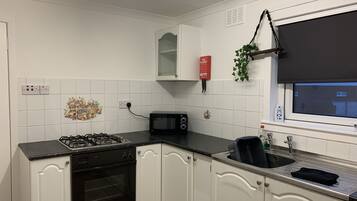 Apartment | Private kitchen | Fridge, microwave, oven, stovetop