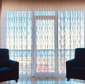 Apartment | Living area | 50-inch LCD TV with satellite channels, TV - Mila Suite (Trabzon)