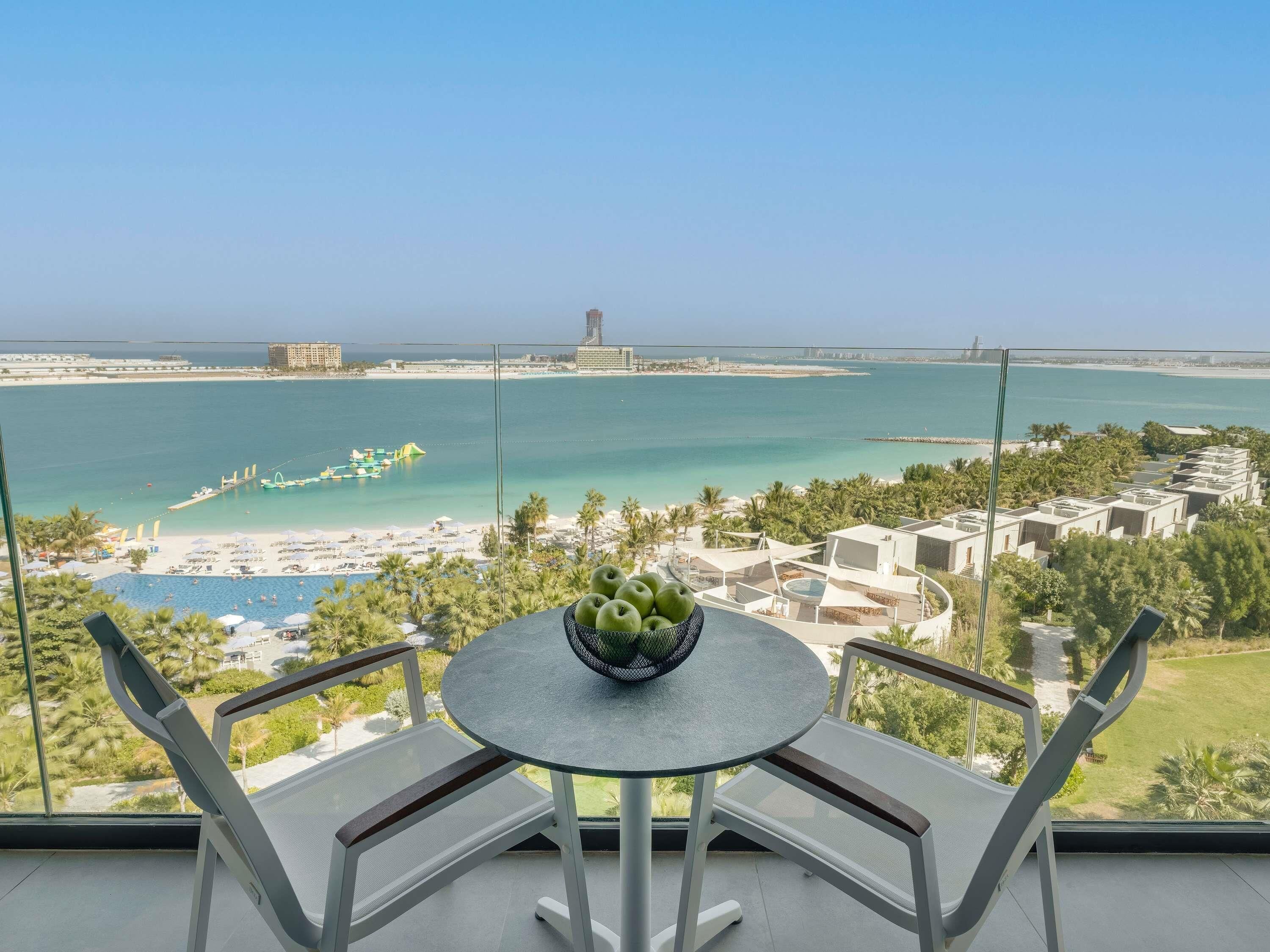 Premium Room, 1 King Bed with Sofa bed (Beach and Pool) | Minibar, in-room safe, desk, laptop workspace