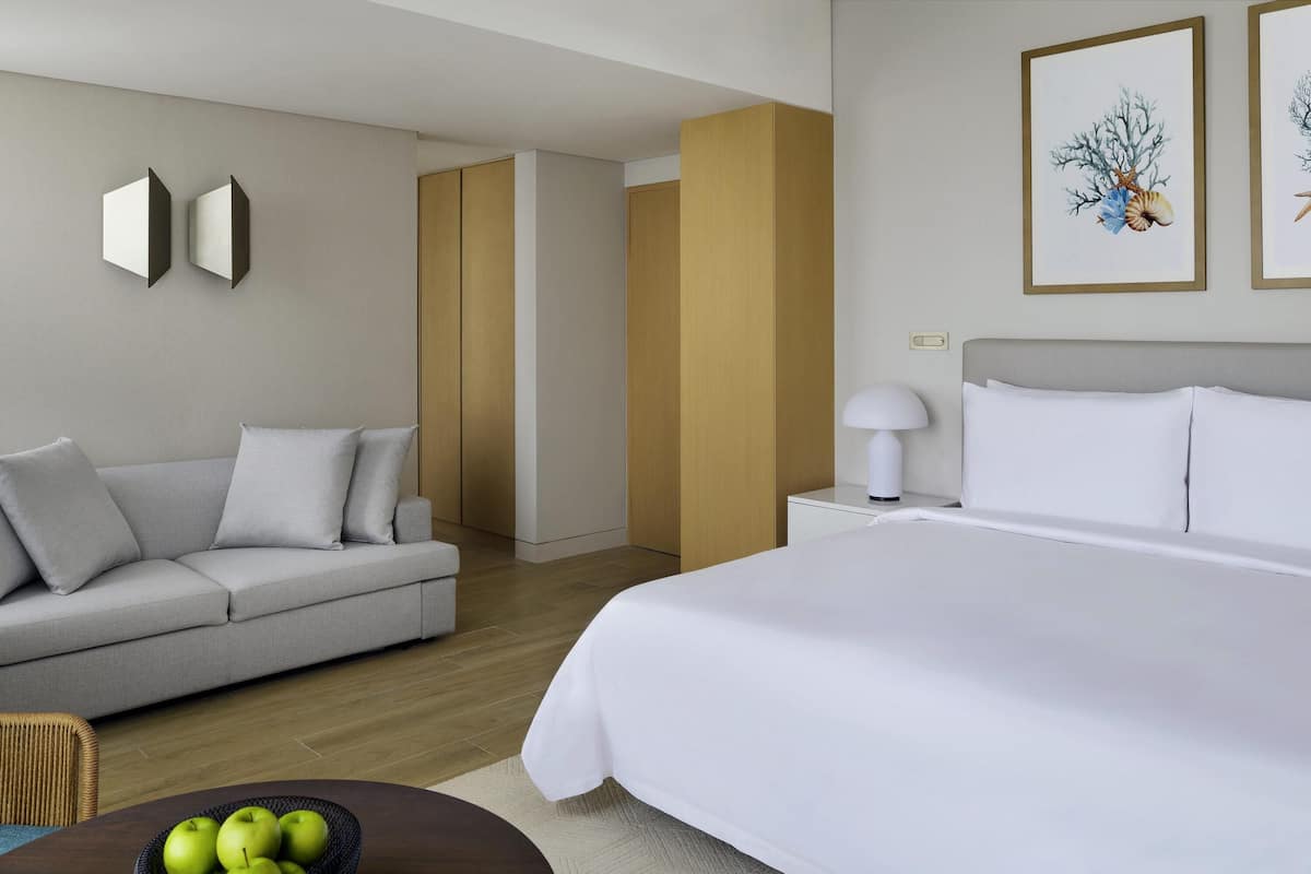 Beachfront Junior Suite with Private Terrace | Minibar, in-room safe, desk, laptop workspace