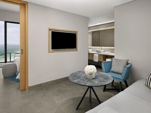 Minibar, in-room safe, desk, laptop workspace - Mövenpick Resort Al Marjan Island (Ras Al Khaimah)