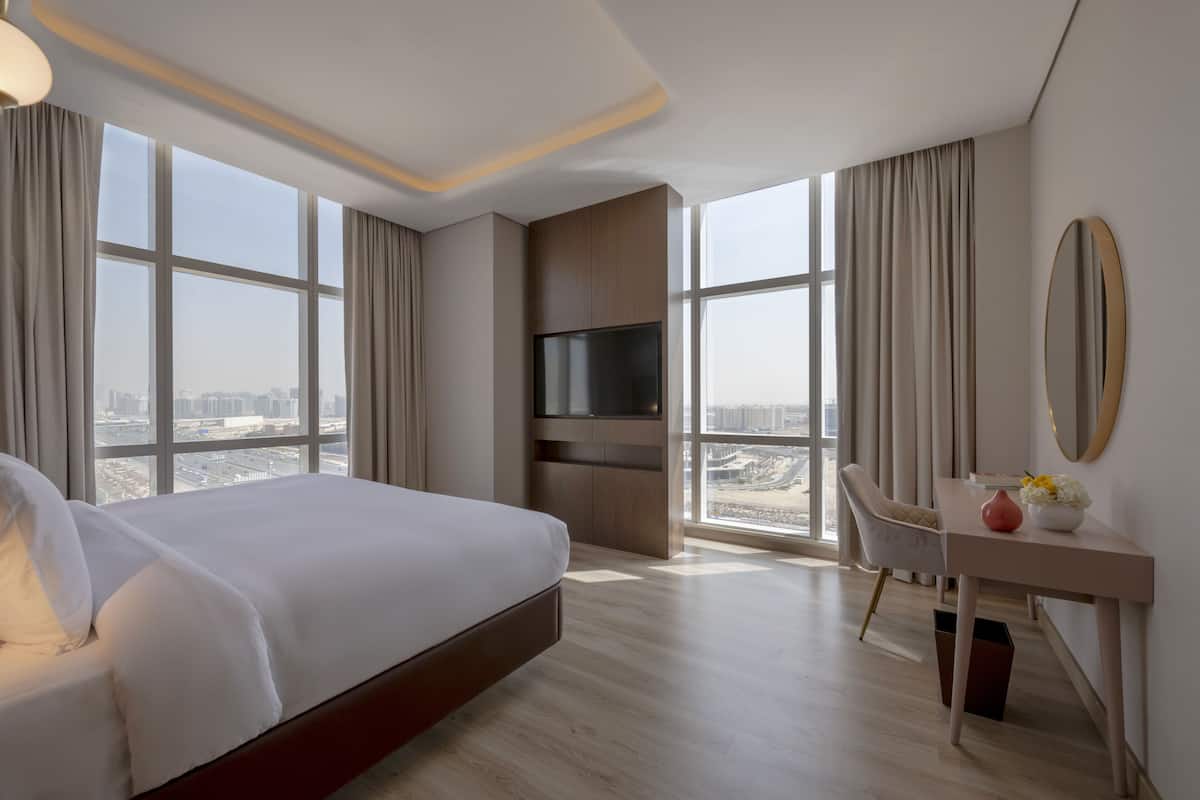 Deluxe Suite, 1 Double Bed, City View | Premium bedding, minibar, in-room safe, individually decorated