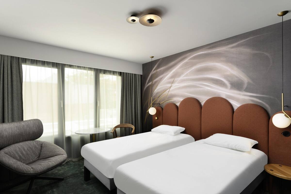 Classic tvåbäddsrum - 2 enkelsängar | 1 sovrum, minibar och värdeförvaringsskåp på rummet