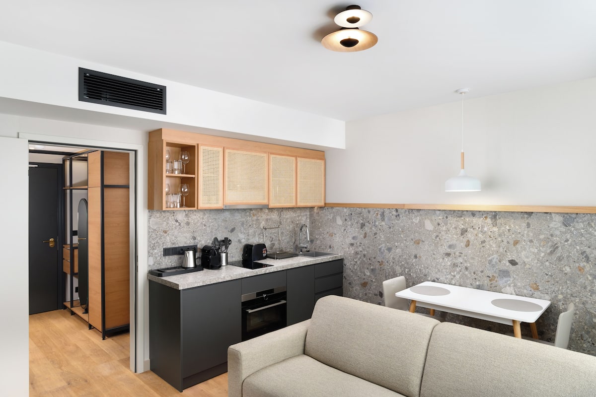 Apartment, 1 Bedroom | 1 bedroom, minibar, in-room safe, individually decorated