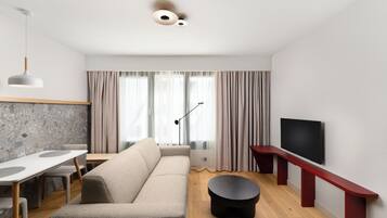 Apartment, 1 Bedroom | Minibar, in-room safe, individually decorated, individually furnished