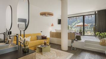 Luxury Room | Living area | 80-inch LED TV with satellite channels, TV, Netflix