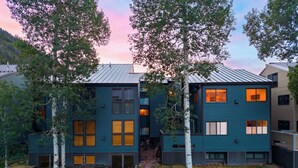 A modern multi-story building with a flat roof, large windows, and a small front entrance. - Telluride Lodge 311 by AvantStay | Close to Slopes & Town! (Telluride)