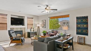Condo, 2 Bedrooms | Living area | 50-inch flat-screen TV with cable channels, Smart TV