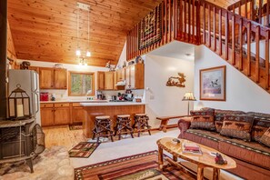 TV, fireplace, books - Riverfront vacation home with a dock, wood stove, full kitchen, & firepit (Lac Du Flambeau)