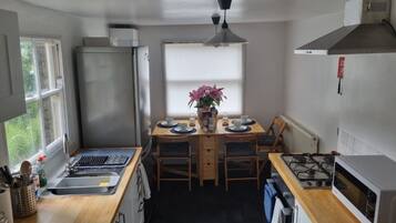 Apartment | Private kitchen | Fridge, microwave, oven, stovetop