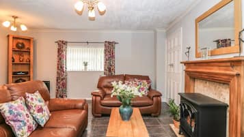 Ferienhaus | Wohnzimmer | Kamin