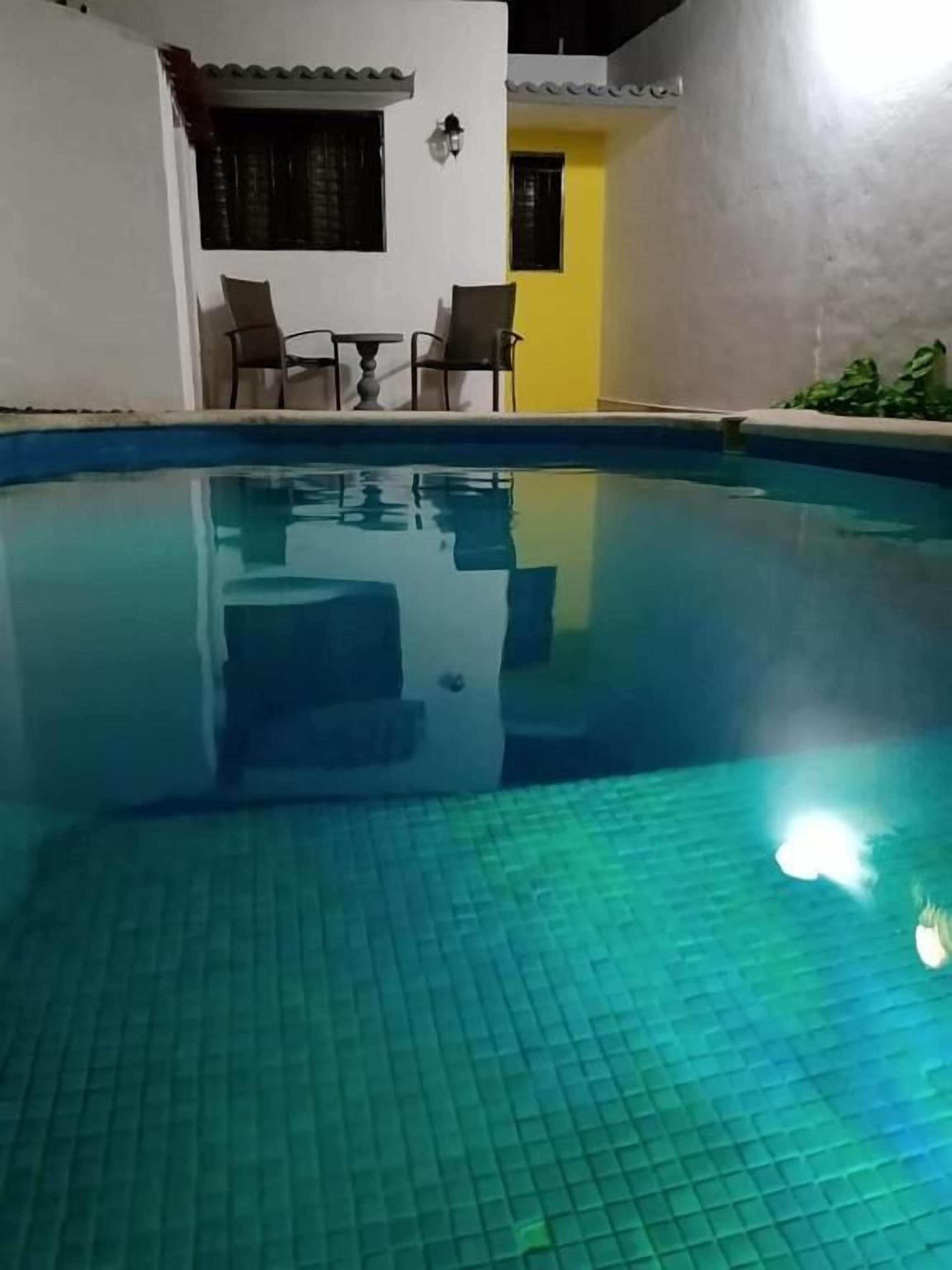 Outdoor pool, open 8:00 AM to 9:00 PM, sun loungers