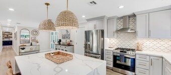 Designer dream with fireplace, game room, private pool, outdoor kitchen, firepit