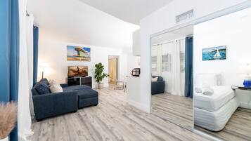 Family Apartment | Living area | Flat-screen TV