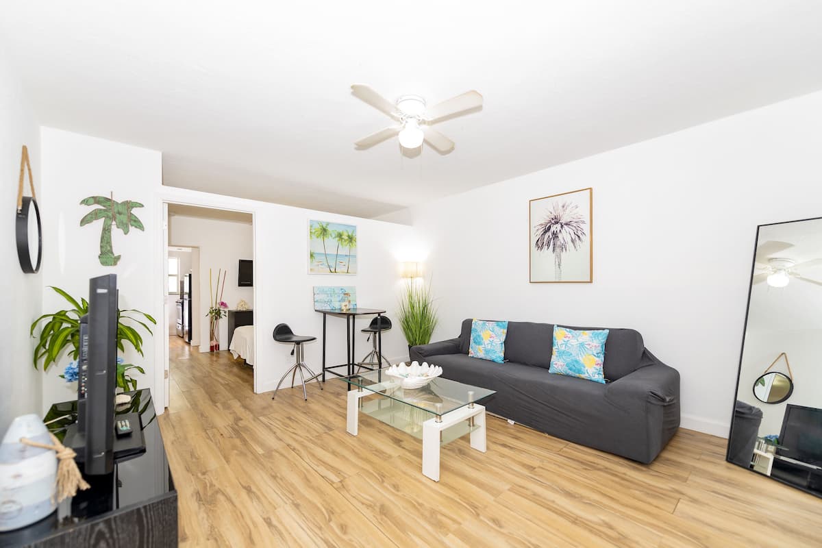 Signature Apartment | Living area | Flat-screen TV