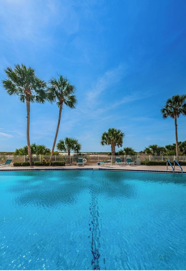 Outdoor pool, a heated pool - Beachfront condo on Sand Key with balconies facing both Beach & The Intracoastal (Clearwater)