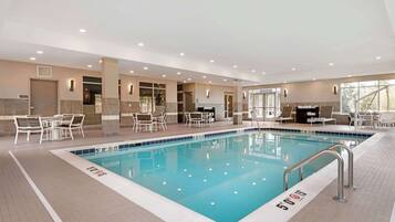 Indoor pool, open 7:00 AM to 11:00 PM, pool loungers