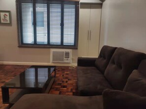 Business-Doppelzimmer, 1 Queen-Bett | Wohnbereich