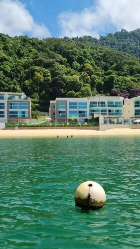 Beautiful apartment in Angra facing the , on the sand with 2 bedrooms, new condominium