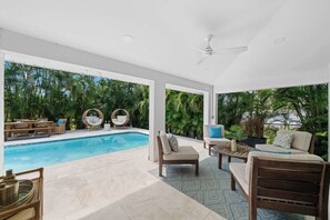 Outdoor pool, a heated pool - 594 Sandy Shore Château w Heated Pool | Walk2Beach (Naples)