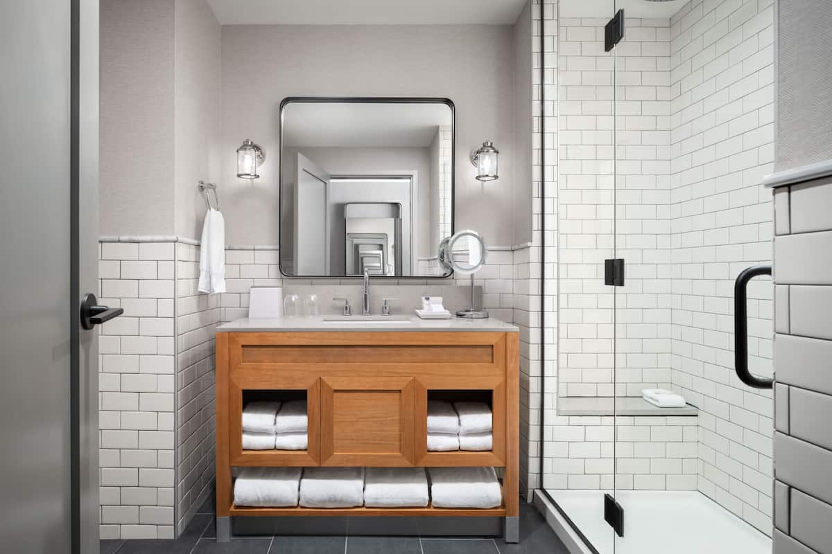 hair dryer, bathrobes, towels, soap