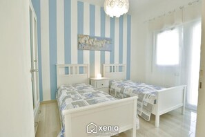 2 bedrooms, desk, iron/ironing board, travel crib