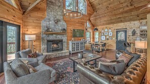 Flat-screen TV, fireplace, computer monitors
