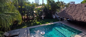 Steps from the beach, pool, games room and privacy!