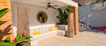 Steps from the beach, pool, games room and privacy!