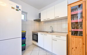 Refrigerador, horno, placa de cocina, lavavajillas