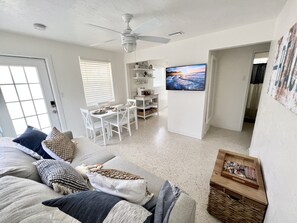 Smart TV, fireplace, books, music library