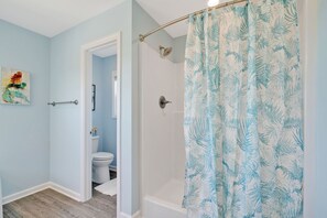 Combined shower/tub, shampoo