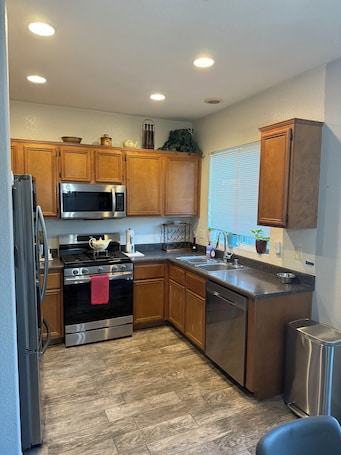 Private kitchen. Nice, & cool 4- bedroom home to enjoy a stay and relax in.